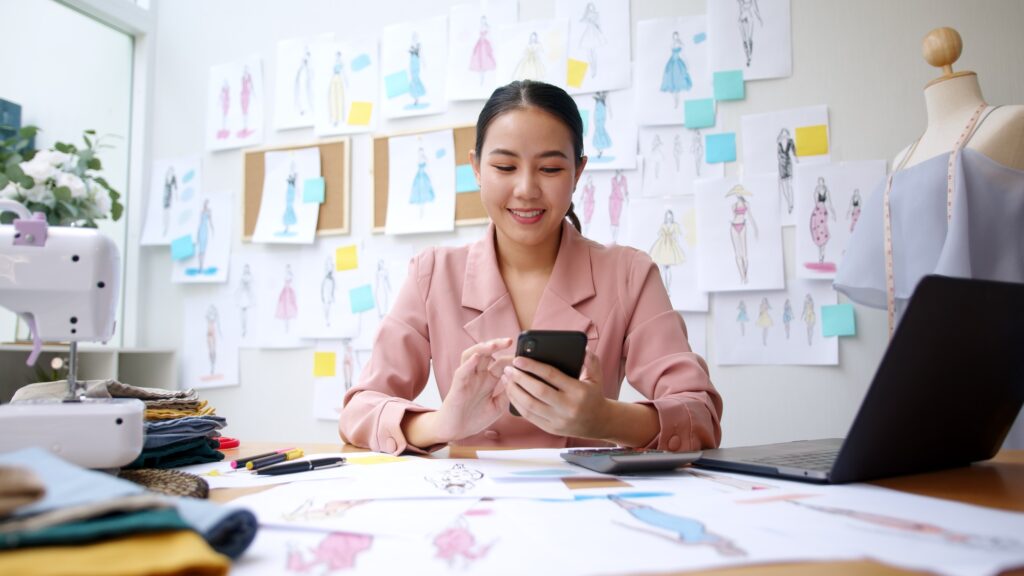 Asia happy people or lady excited sell smile enjoy good news work at home studio office